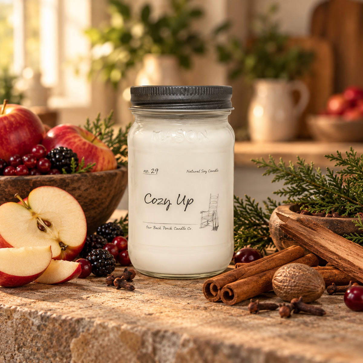 Cozy Up 16 oz soy candle by Back Porch Candle Co. styled with apples, berries, warm spices, sandalwood and cypress.