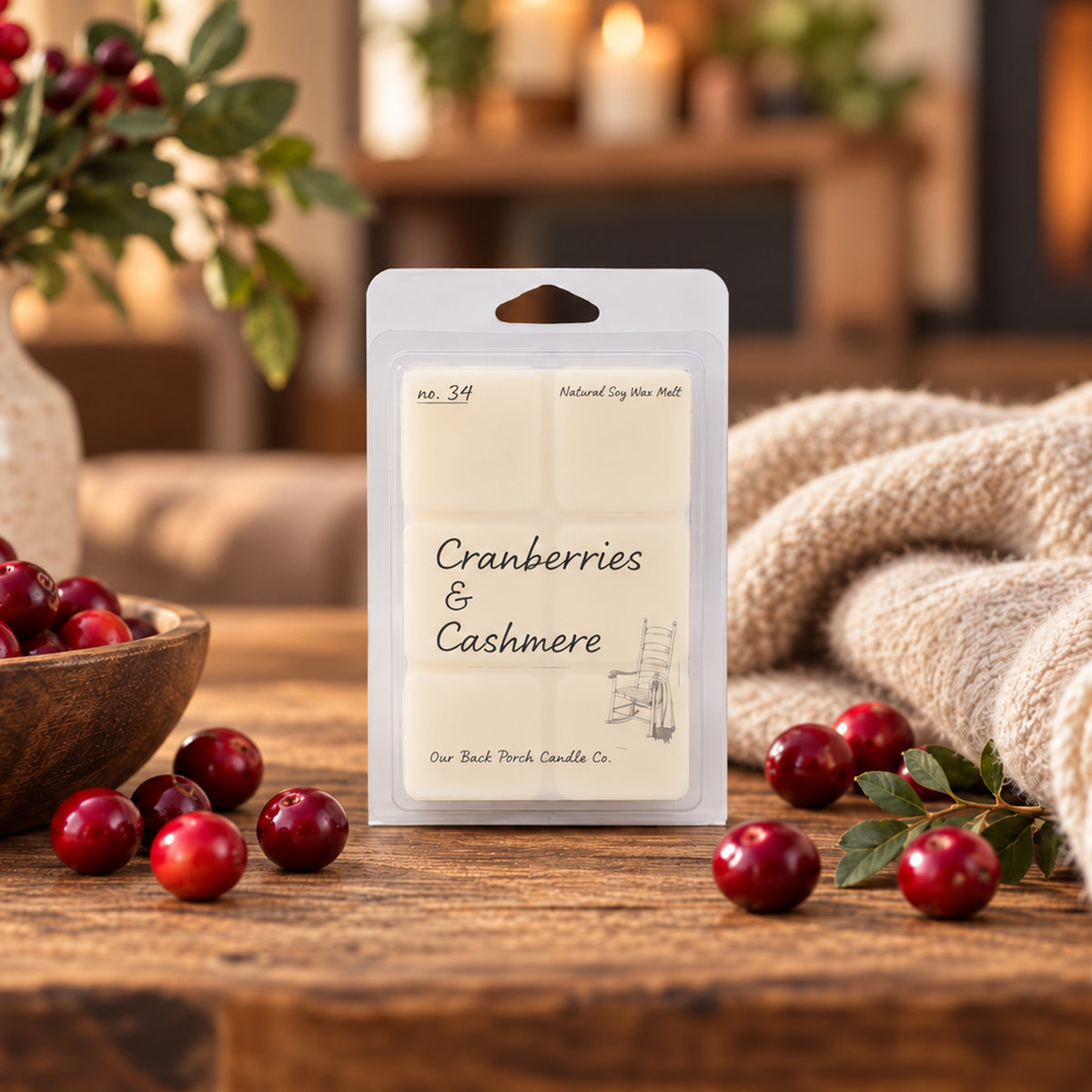 Cranberries & Cashmere soy wax melt by Back Porch Candle Co. styled with cranberries, soft cashmere textures, and warm seasonal accents.