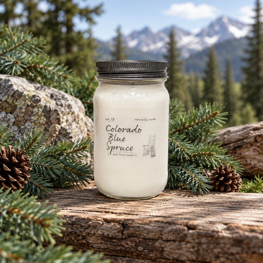 Colorado Blue Spruce 16 oz soy candle by Back Porch Candle Co. in a Rocky Mountain evergreen setting.