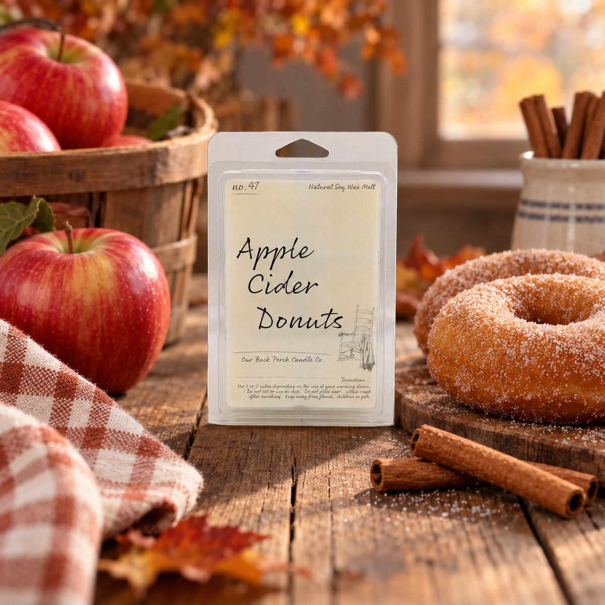 Apple Cider Donuts 6 oz soy wax melt by Back Porch Candle Co. with apples, cider donuts, and cinnamon in a warm farmhouse setting.