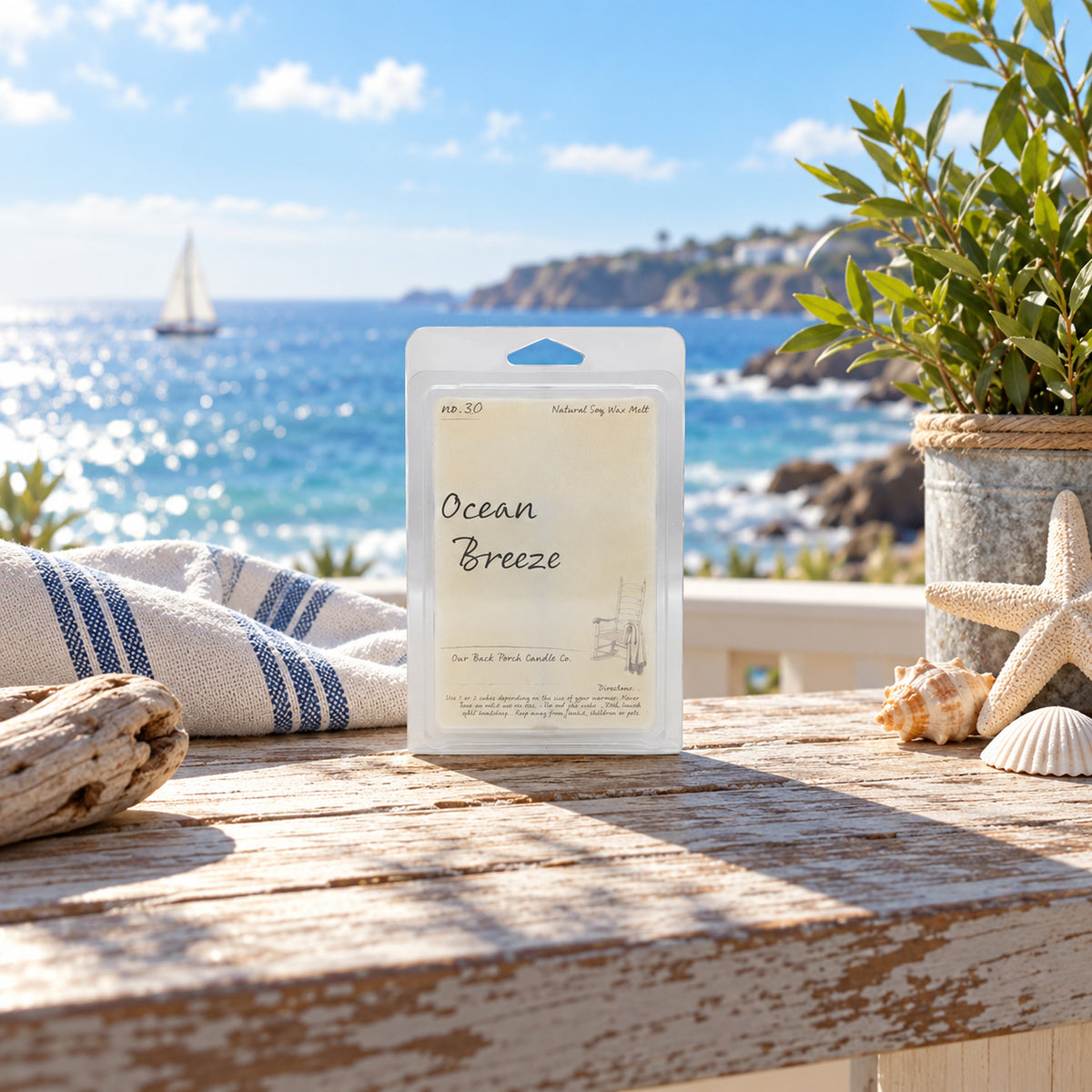 Ocean Breeze soy wax melt by Back Porch Candle Co. styled with coastal details, shells, driftwood, and bright ocean light.