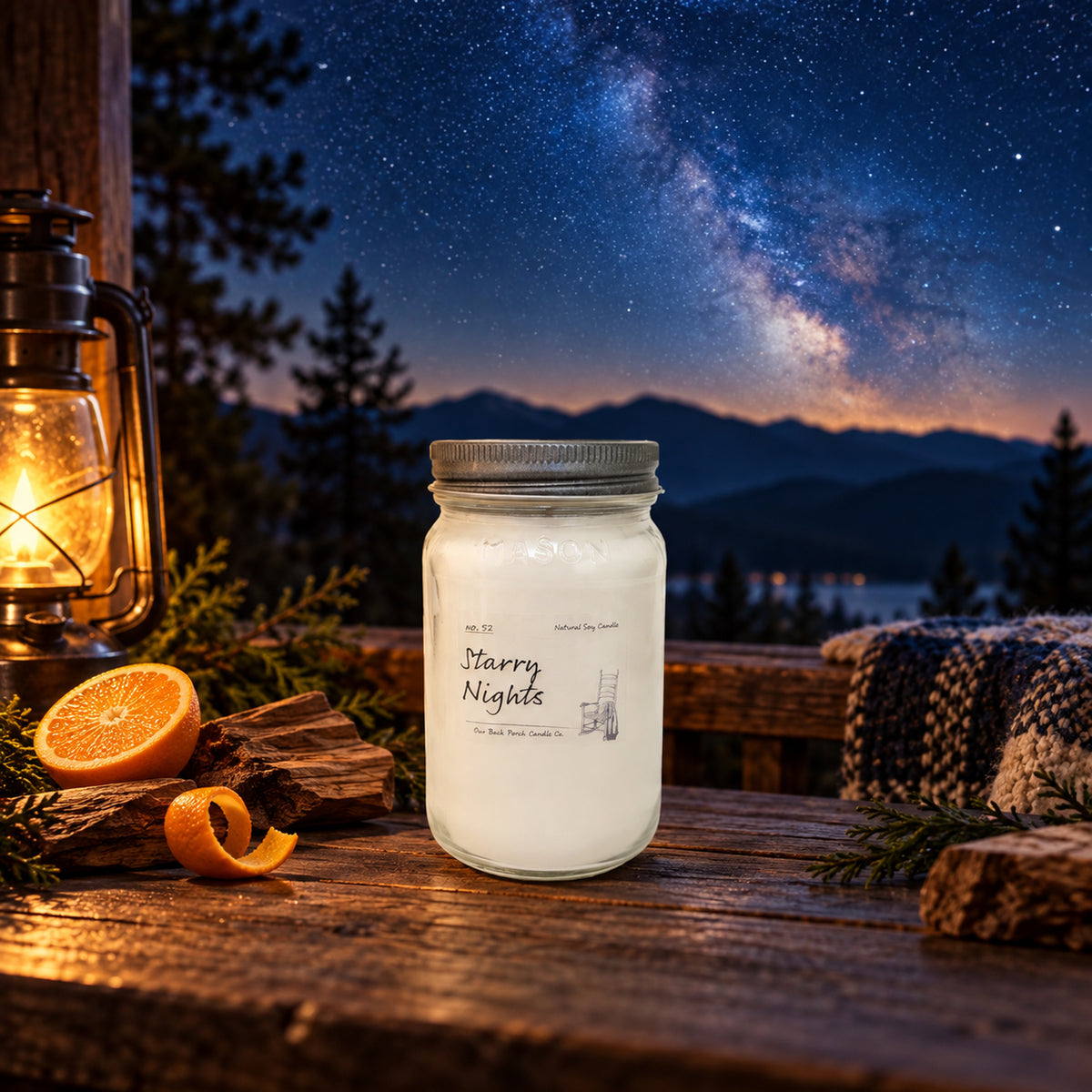 Starry Nights 16 oz soy candle by Back Porch Candle Co. styled with bergamot orange, rich sandalwood, warm woods, and sophisticated evening ambiance.